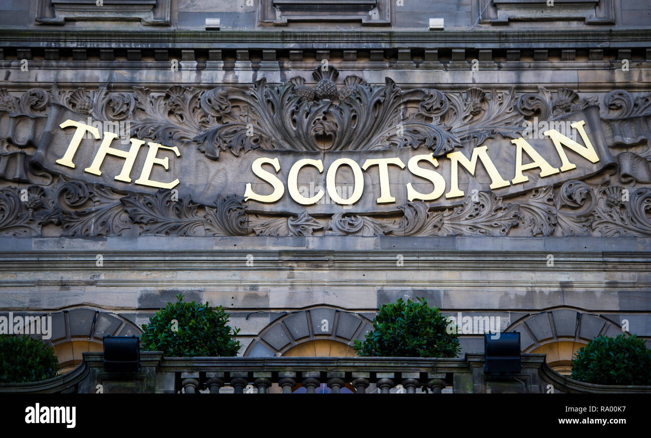 The Scotsman newspaper masthead carved in stone on the former Scotsman newspaper offices,  North Bridge, Edinburgh. Stock Photo