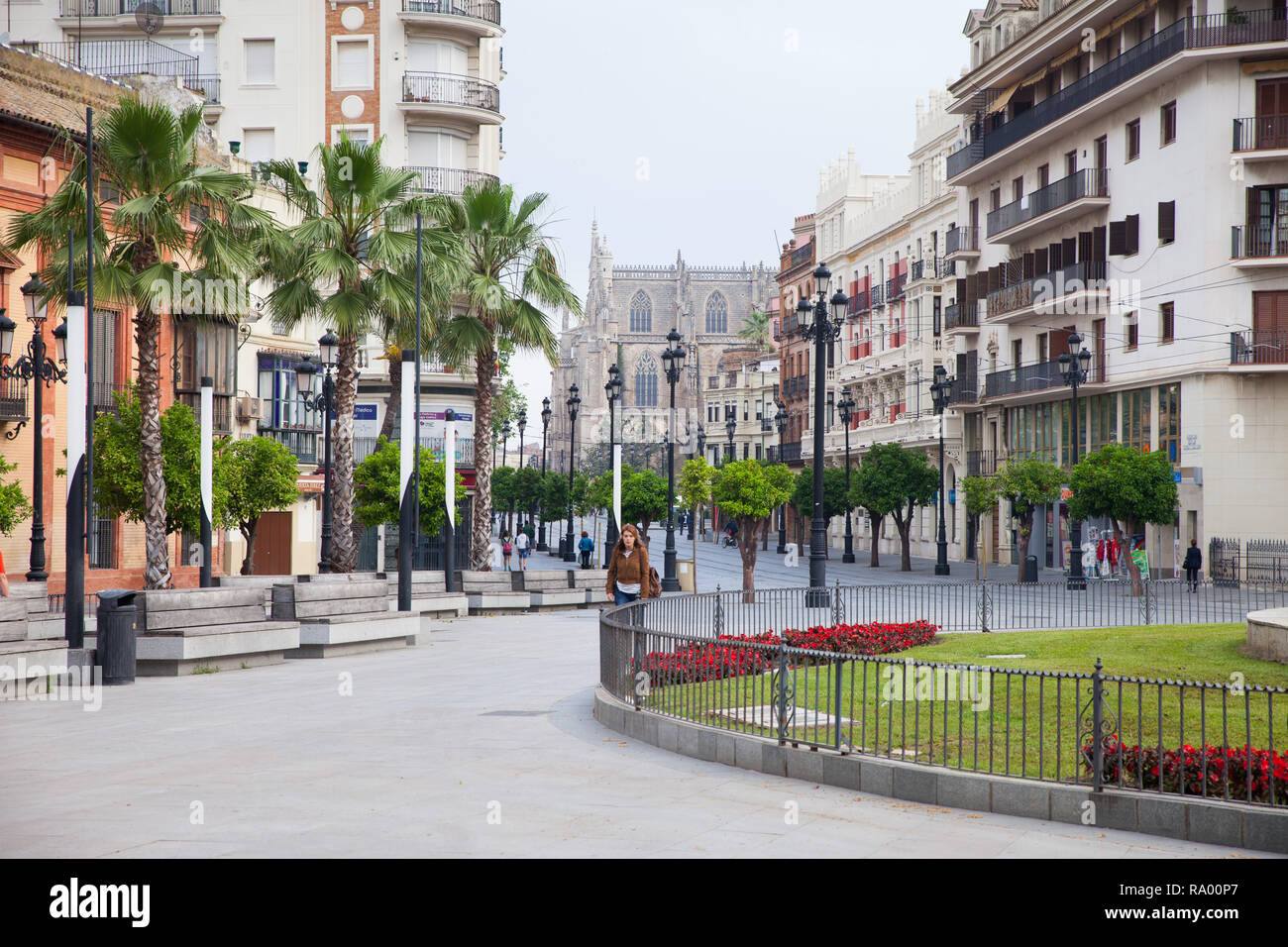 April 27, 2013 - Sevilla, Spain: Streets of Sevilla, near Hispalis Fountains; view to St. Constitution Street (Sevilla Cathedral at background). Stock Photo