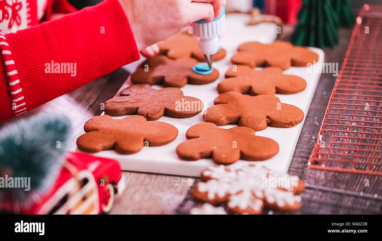 Step by step. Decorating gingerbread cookies with royal icing Stock