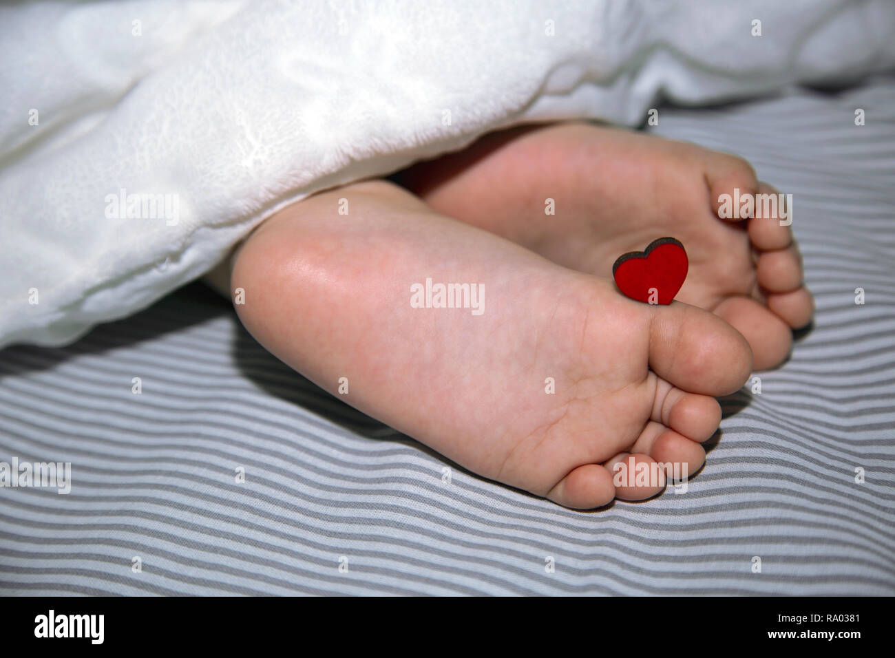 Little boy feet bed hires stock photography and images Alamy