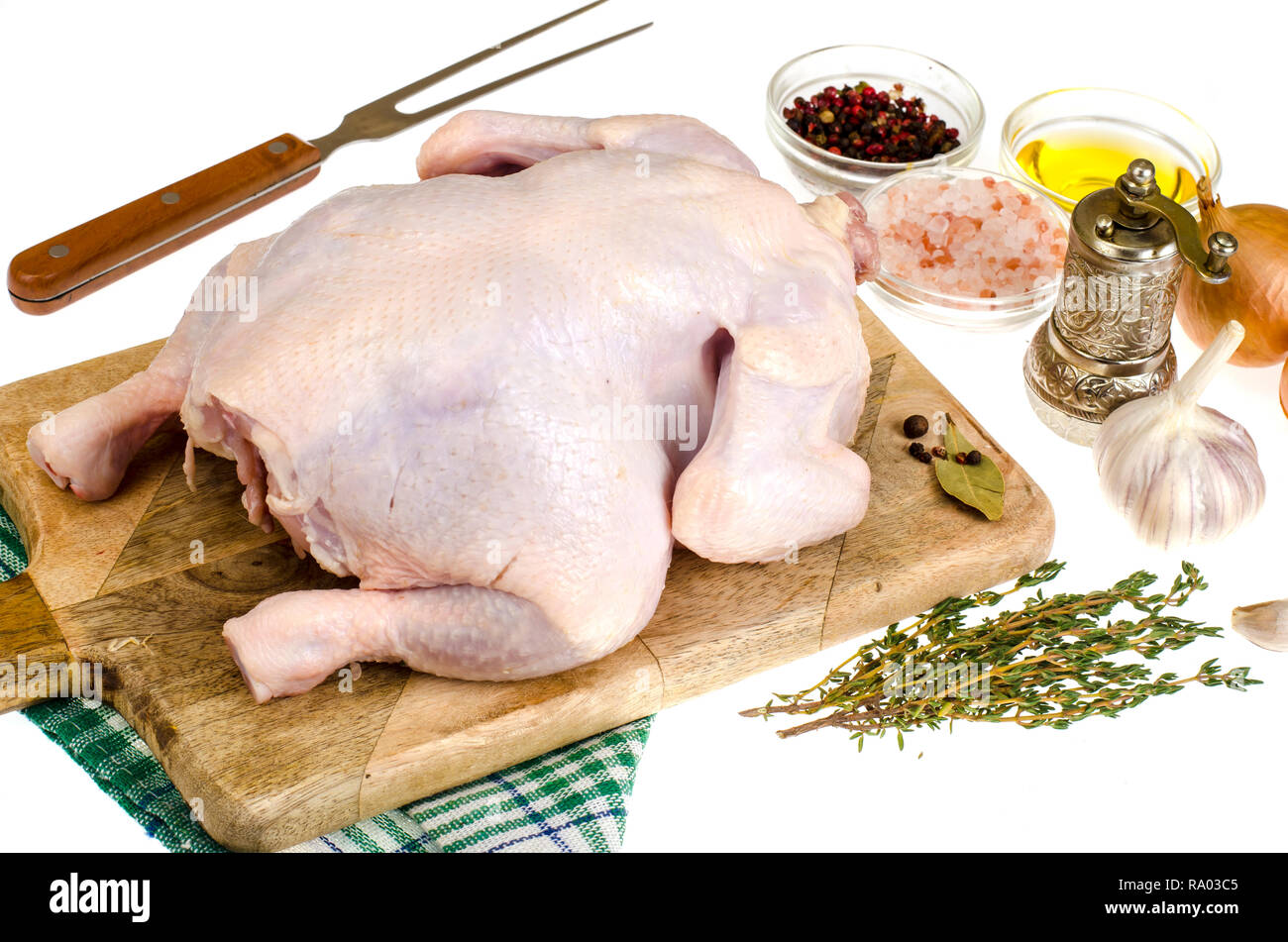 Raw chicken and vegetables on a cutting board Stock Photo - Alamy