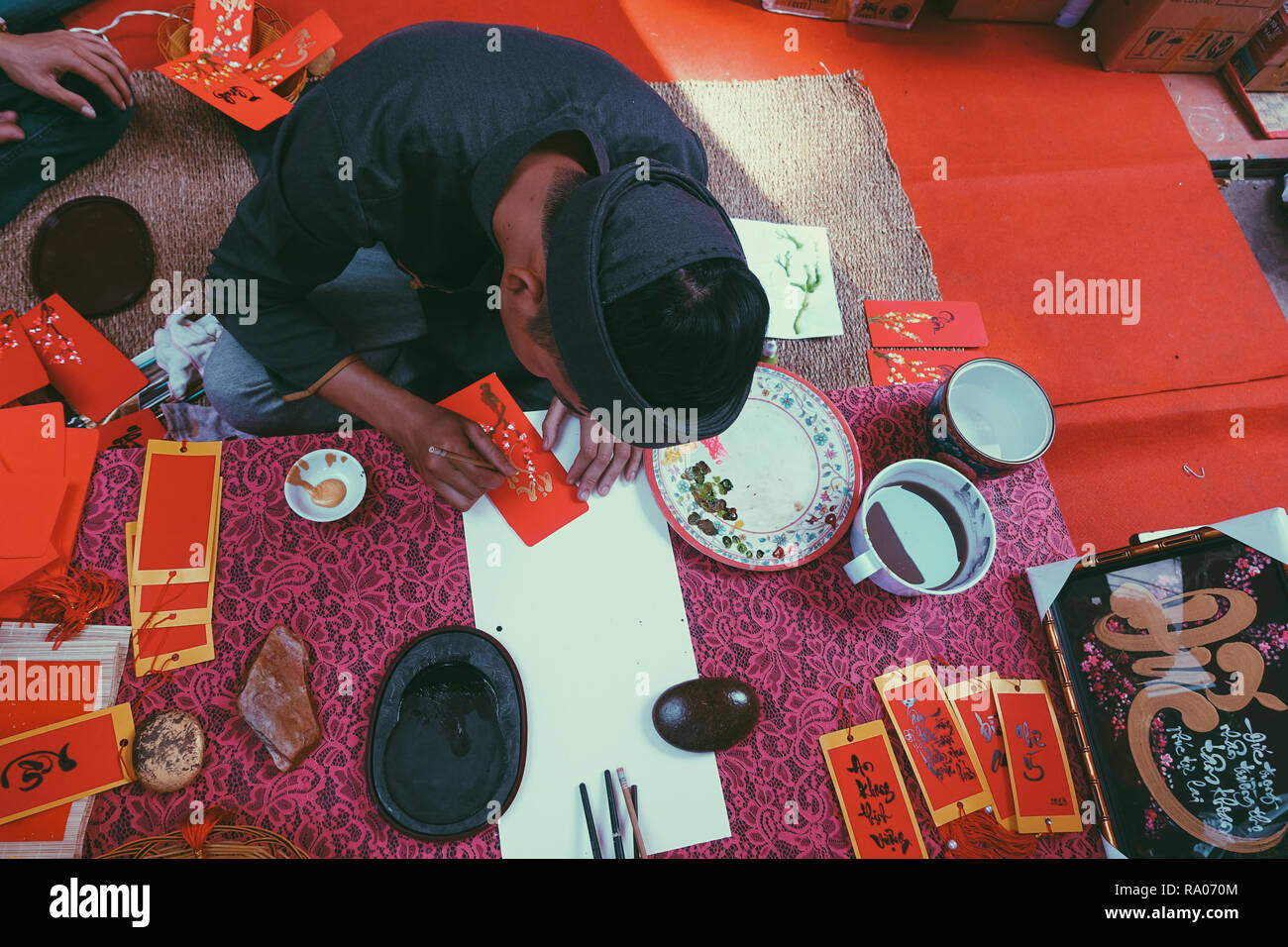 Vietnamese Scholar Write Calligraphy At Lunar New Year Calligraphy Festival Is A Popular Tradition During Vietnam Tet Holiday Calligrapher Draw Stock Photo Alamy