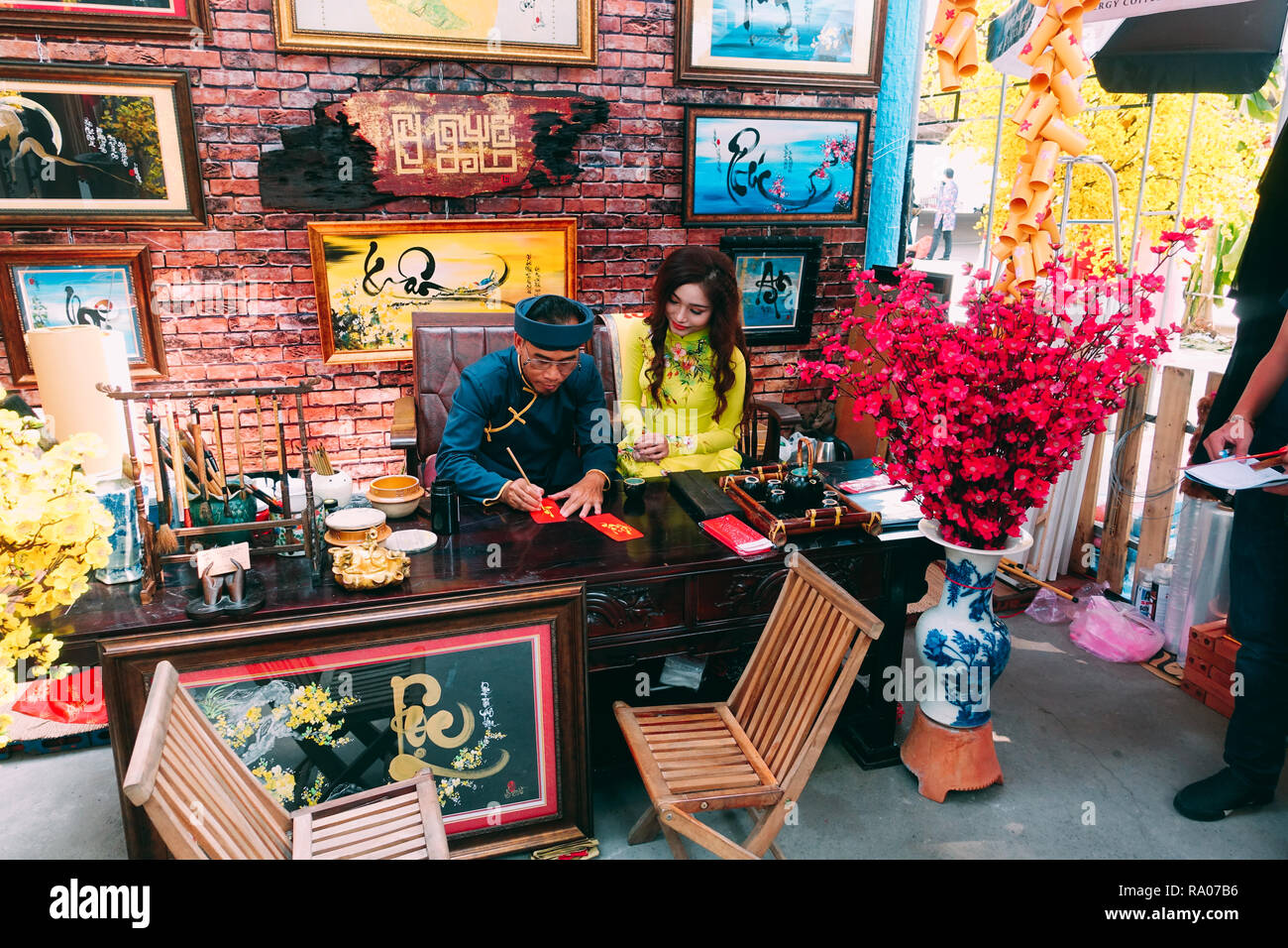 Vietnamese Scholar Write Calligraphy At Lunar New Year Calligraphy Festival Is A Popular Tradition During Vietnam Tet Holiday Calligrapher Draw Stock Photo Alamy
