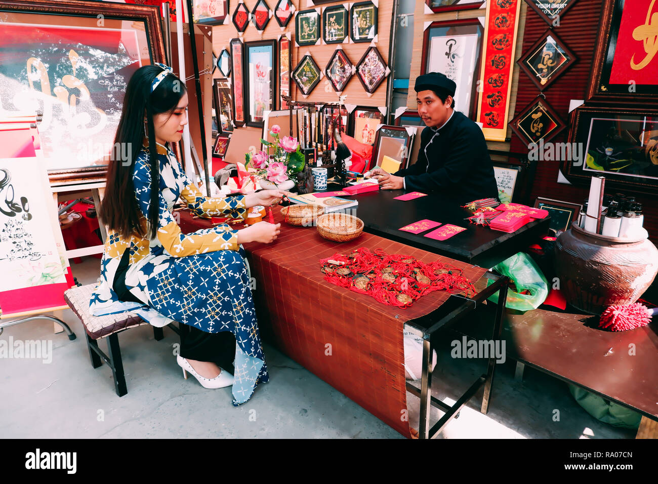Vietnamese Scholar Write Calligraphy At Lunar New Year Calligraphy Festival Is A Popular Tradition During Vietnam Tet Holiday Calligrapher Draw Stock Photo Alamy