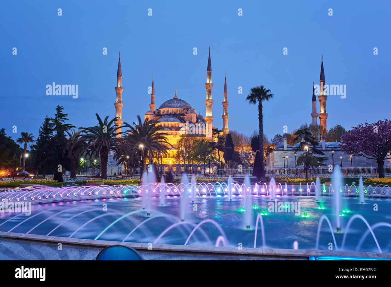 Fountain and The Sultan Ahmed Mosque in Istanbul during sunset Stock ...