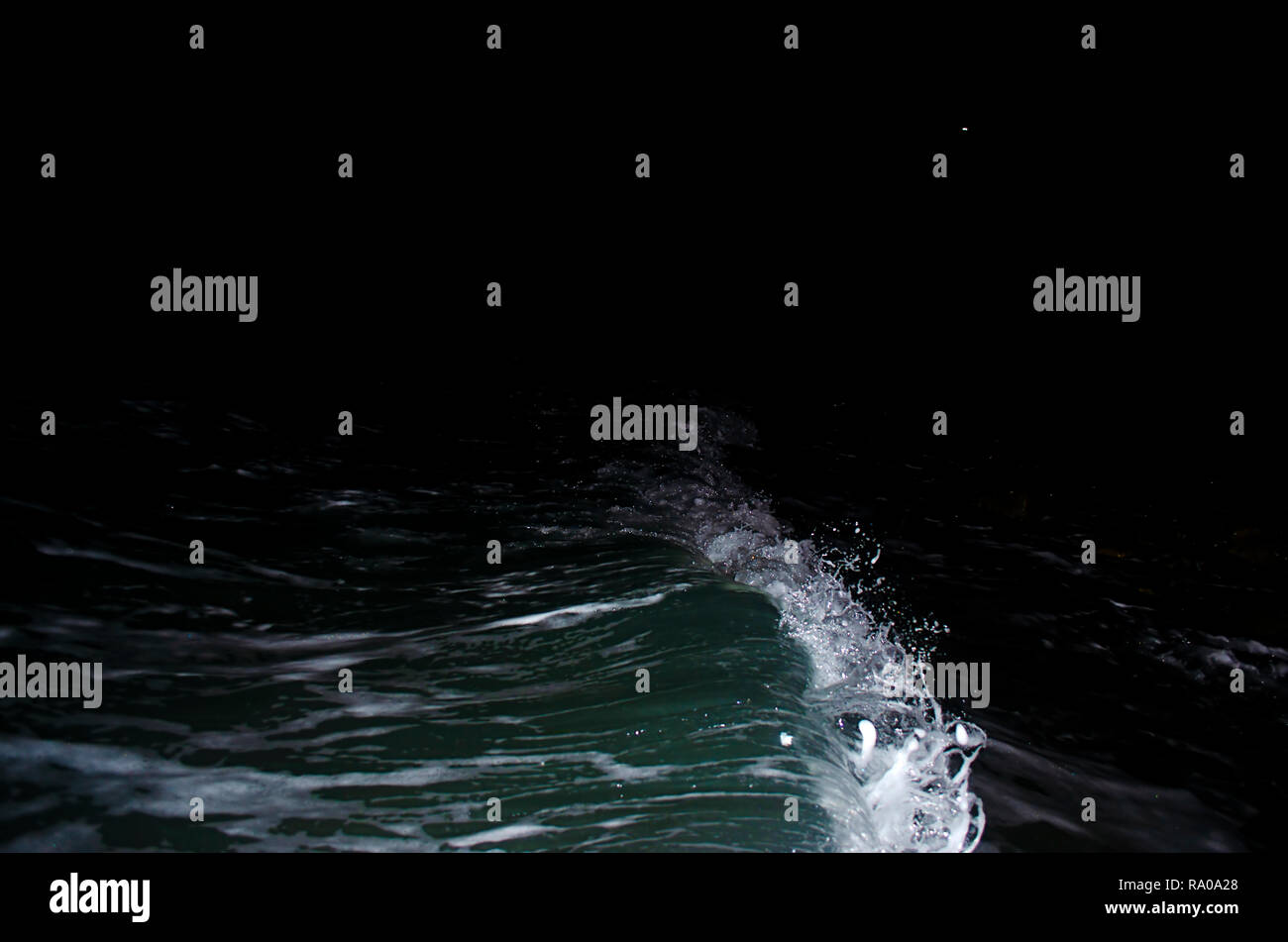 Splashing wave on the Black sea in the night Stock