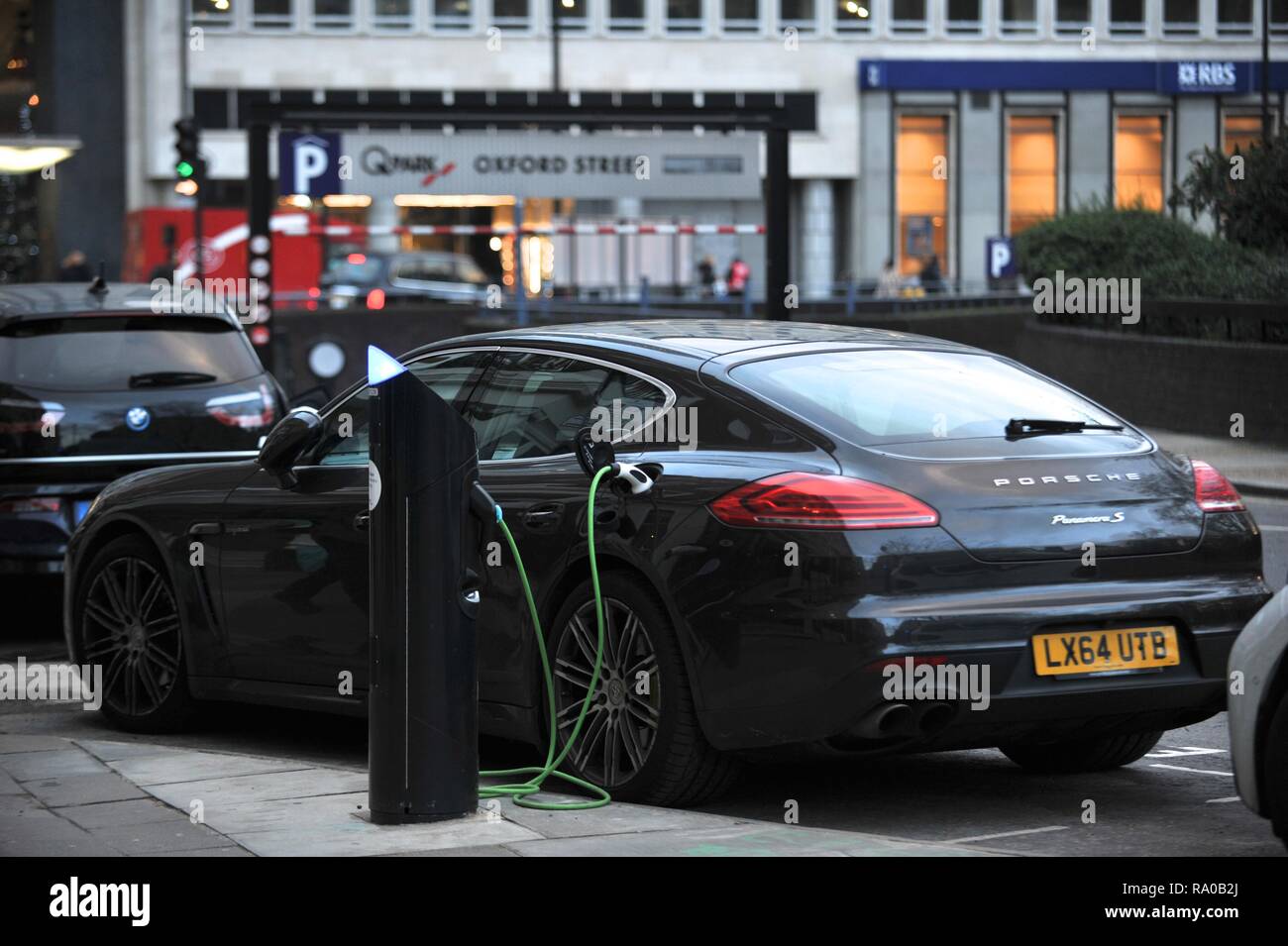electric vehicles being charged Stock Photo Alamy