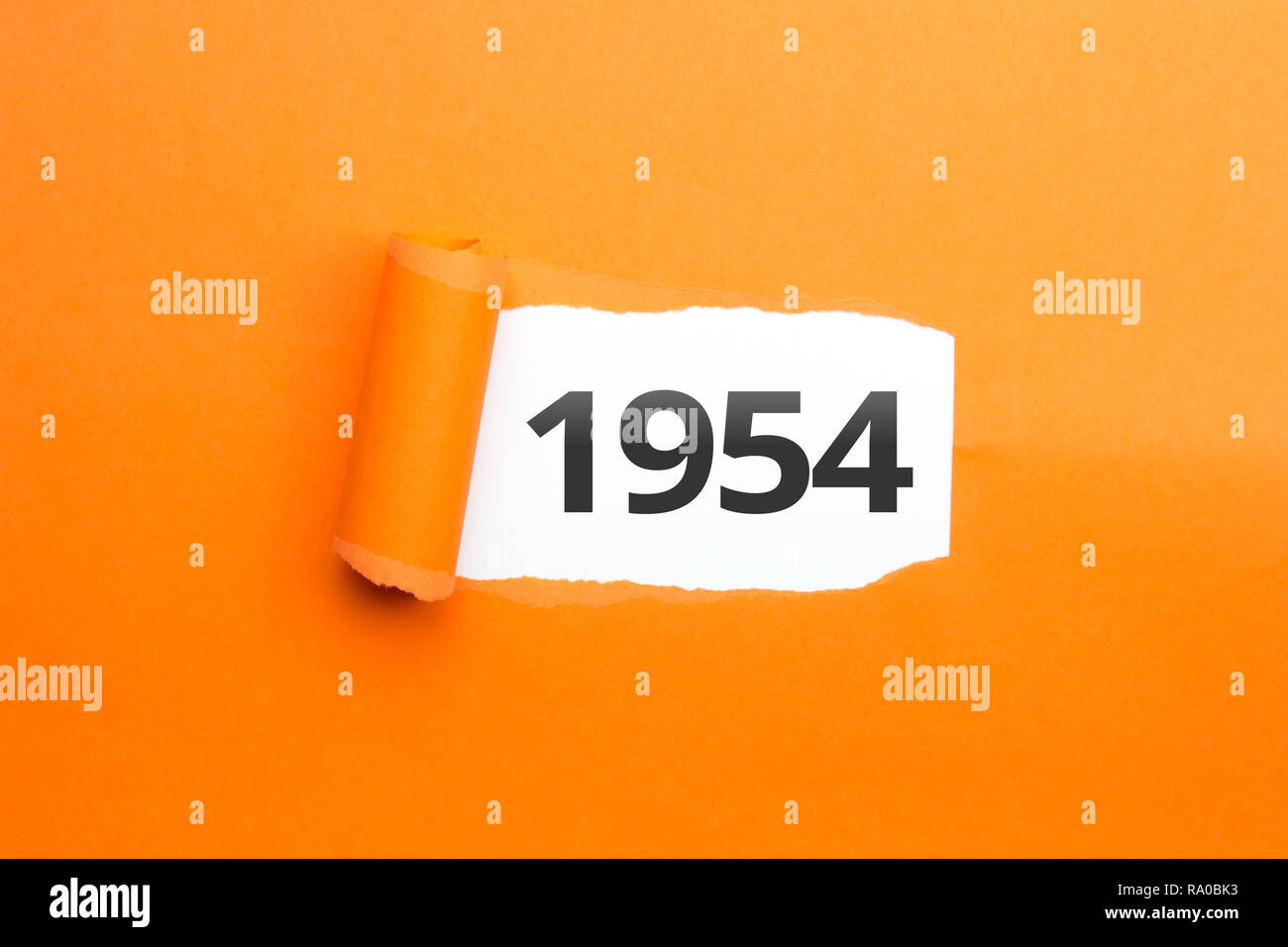 surprising Number / Year 1954 orange background Stock Photo