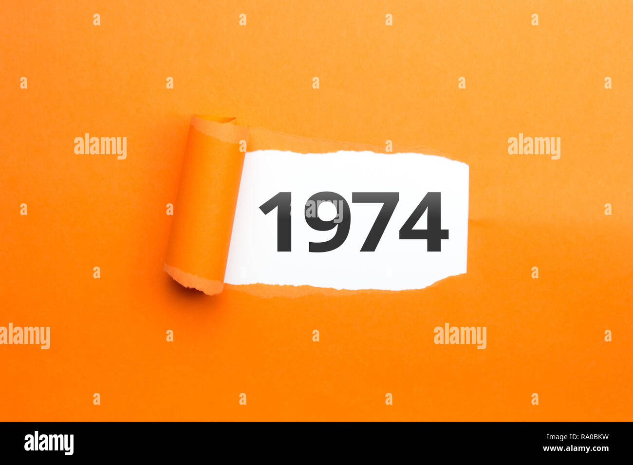 surprising Number / Year 1974 orange background Stock Photo