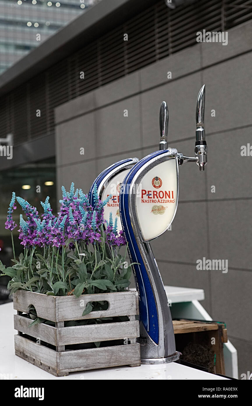 Draft beer dispenser, Peroni nastro azzurro pump Stock Photo
