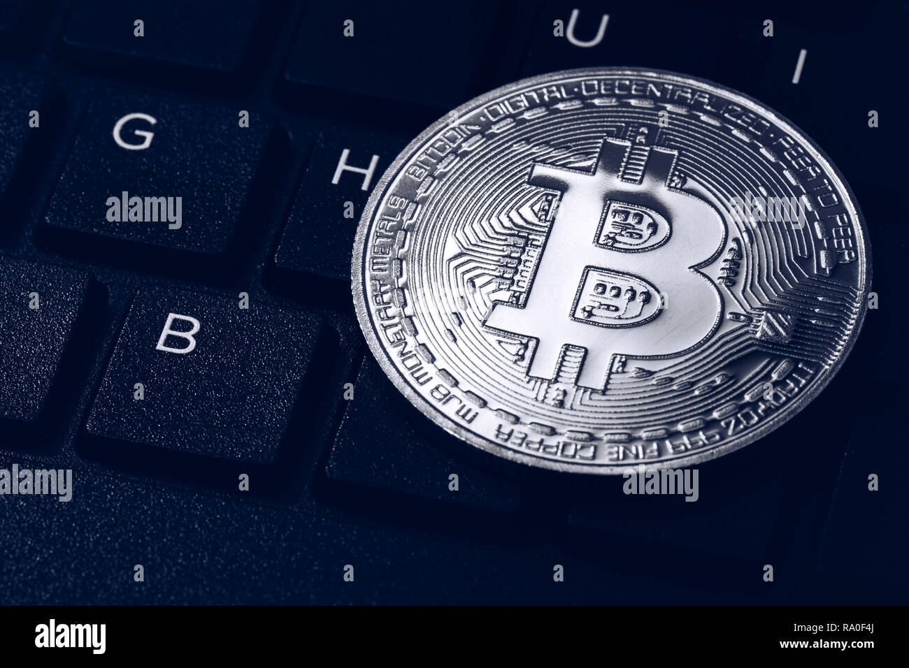 Coins bitcoin, the money lies, on the bill table of 50 dollars. The  banknotes are spread on the table in a free order of 50 dollars. Gold coins  are cr Stock Photo - Alamy