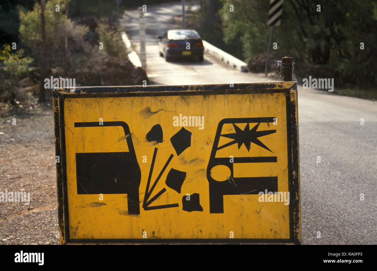 ROAD SIGN, NEW SOUTH WALES. WARNING DRIVERS THAT PASSING CARS CAN FLICK ...