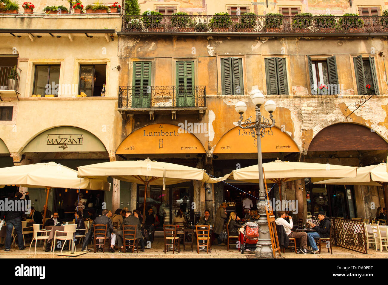 Cafes in historic Piazza Erbe in Verona. Stock Photo