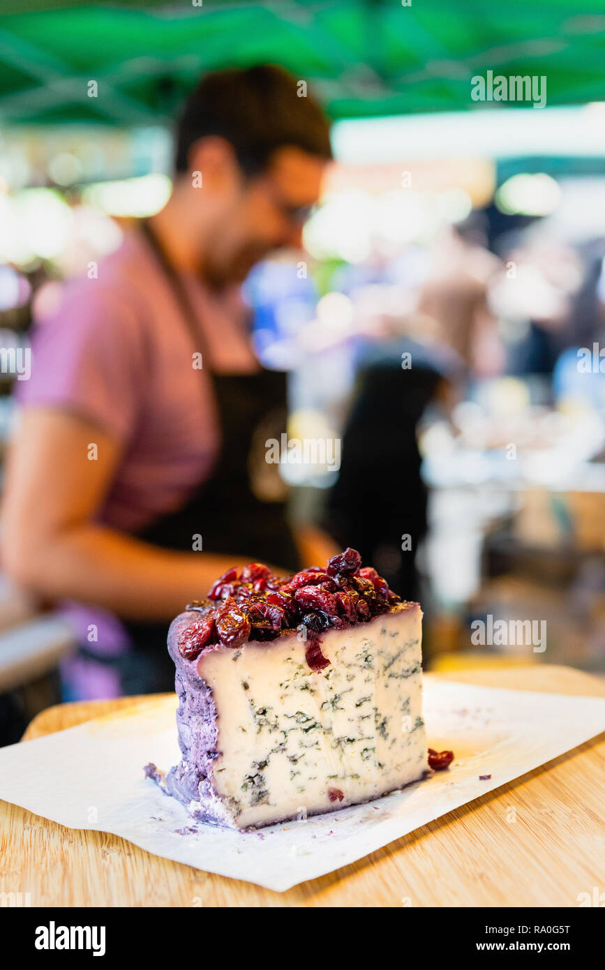 Cheese stall vendor at Borough Market, London Stock Photo Alamy