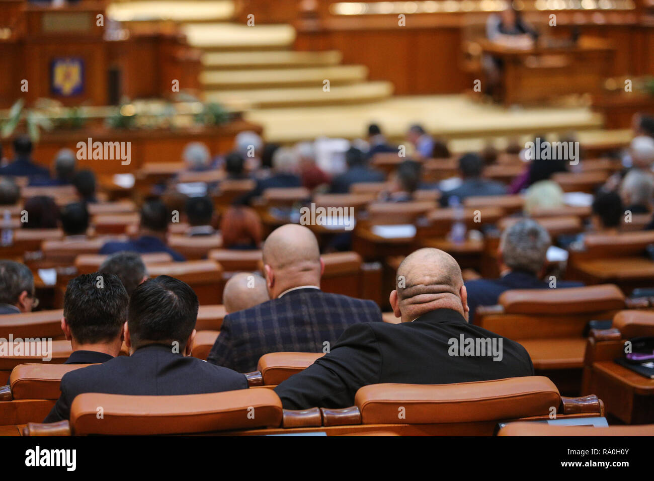 BUCHAREST, ROMANIA - December 12, 2018: Romanian member of Parliament is taking part at a meeting in the Chamber of Deputies Stock Photo