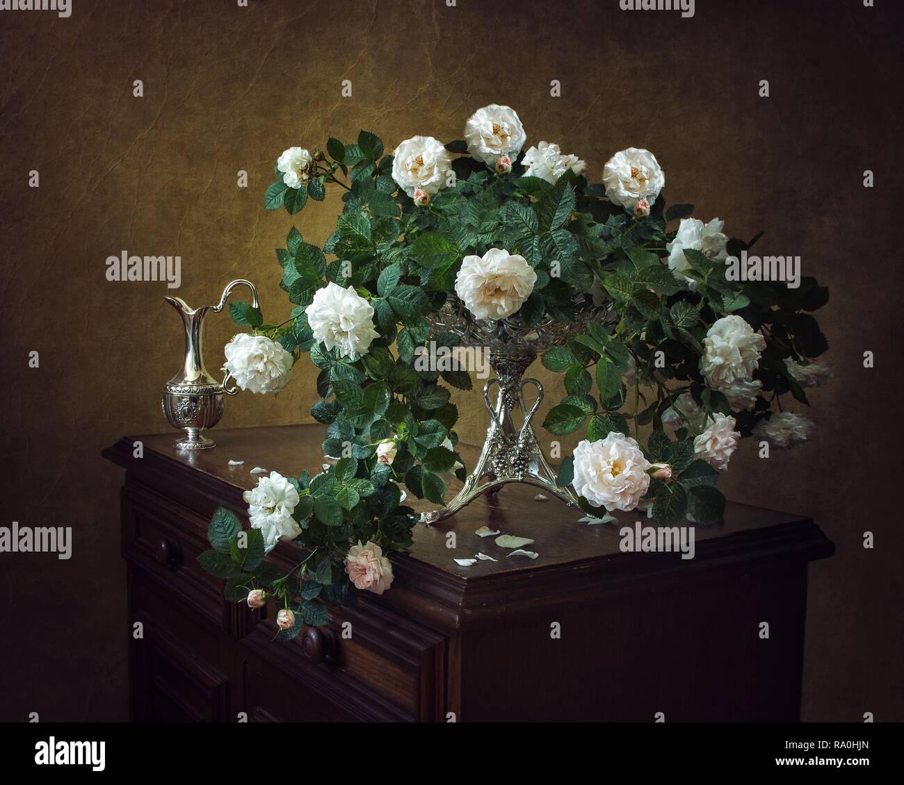 Still life with bouquet of white spray roses Stock Photo - Alamy