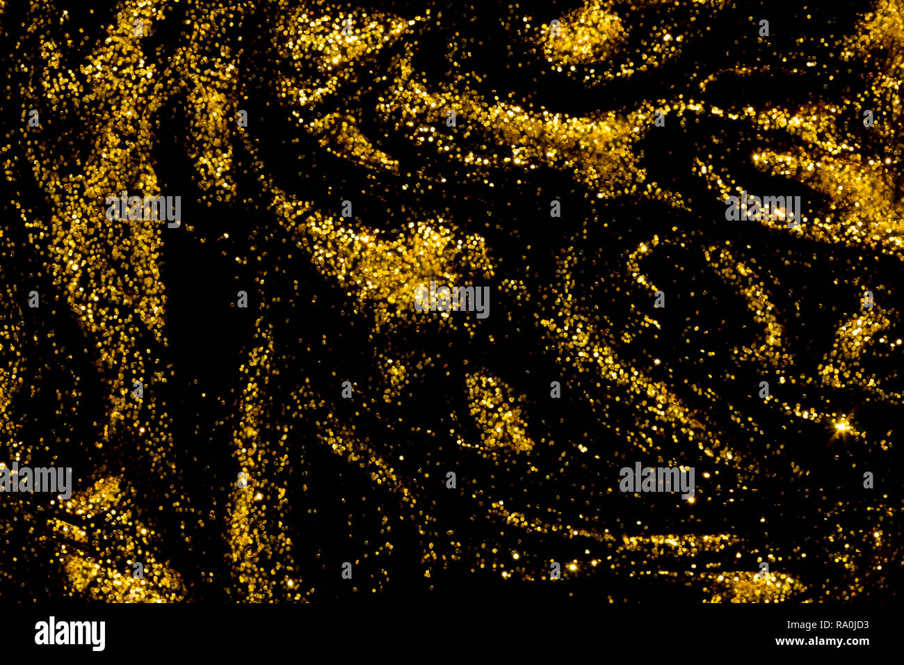 Abstract background of black and gold metallic glitter paint swirls Stock  Photo - Alamy