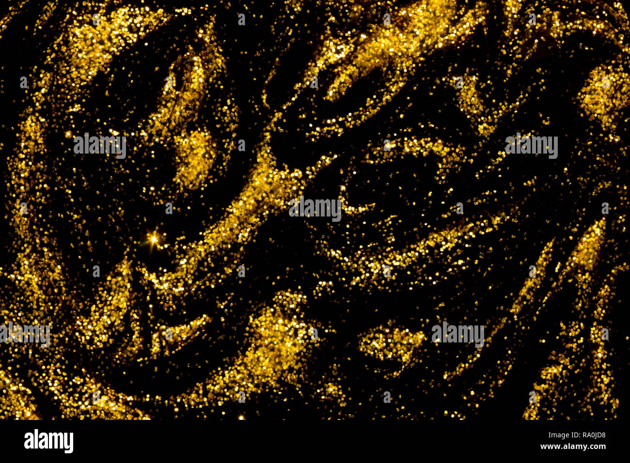 Abstract background of black and gold metallic glitter paint swirls Stock  Photo - Alamy