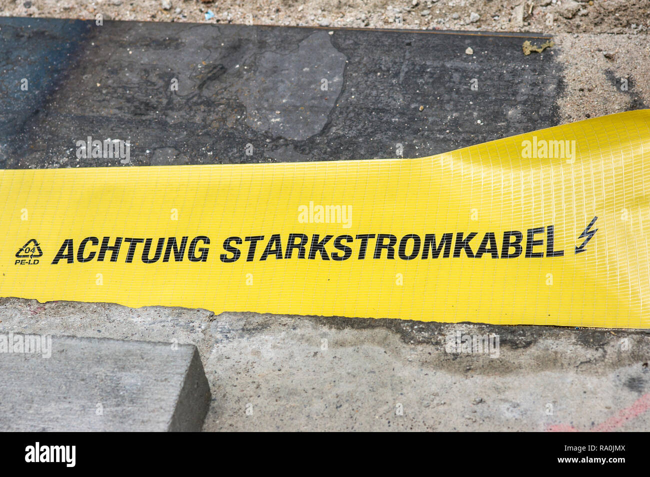 achtung starkstromkabel ;  attention, high voltage power cable  Stock Photo