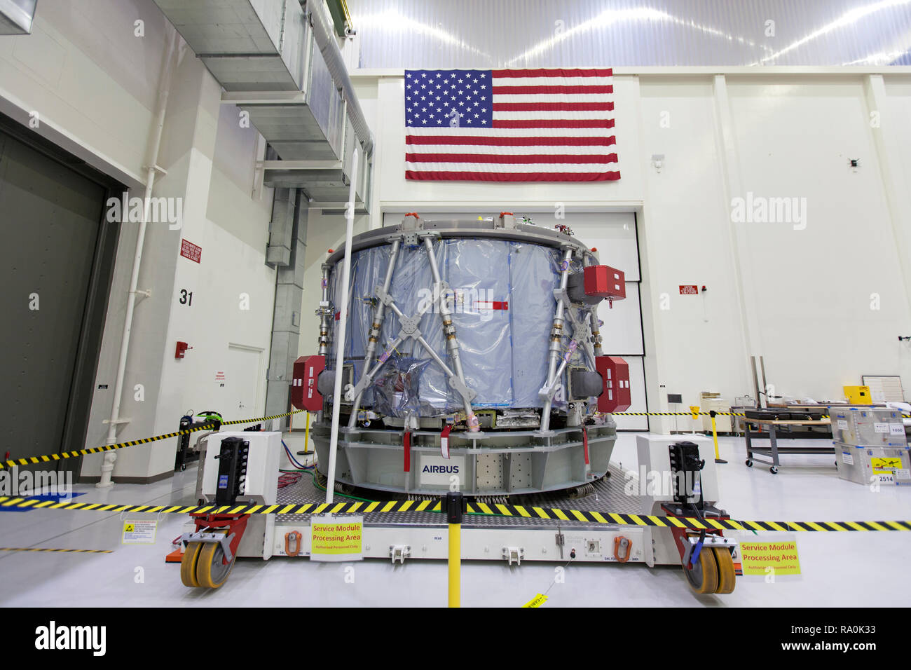 The European Service Module is unpacked inside the Neil Armstrong Operations and Checkout Building high bay at the Kennedy Space Center November 7, 2018 in Cape Canaveral, Florida. The ESM is provided by the European Space Agency, and built by Airbus Defence and Space. It will supply the main propulsion system and power to the Orion spacecraft for Exploration Mission-1, a mission around the Moon. The ESM also will house air and water for astronauts on future missions. EM-1 will be an uncrewed flight test that will provide a foundation for human deep space exploration to destinations beyond Ear Stock Photo