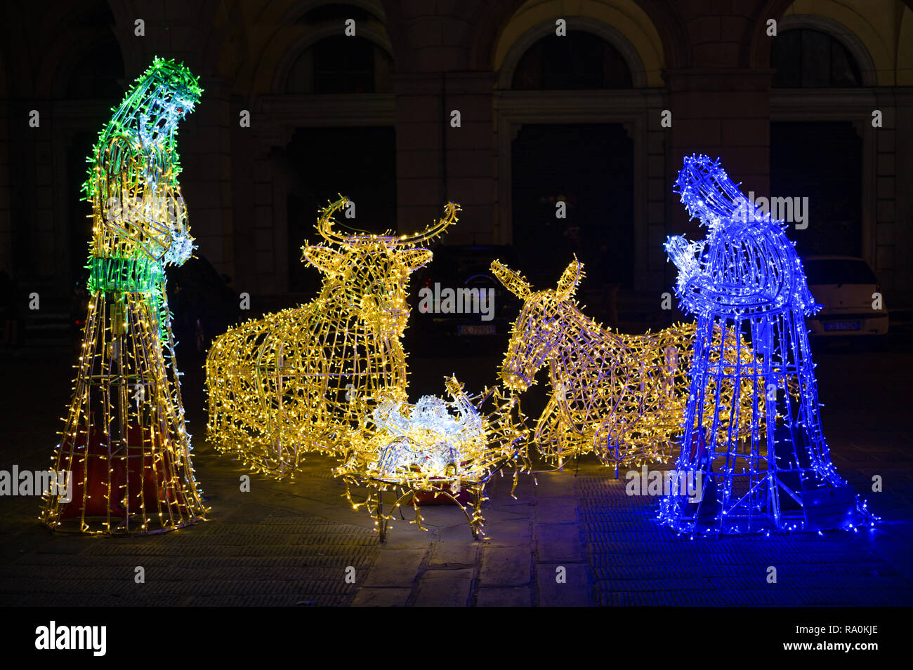 Christmas nativity scene illuminated with colored lights Stock Photo