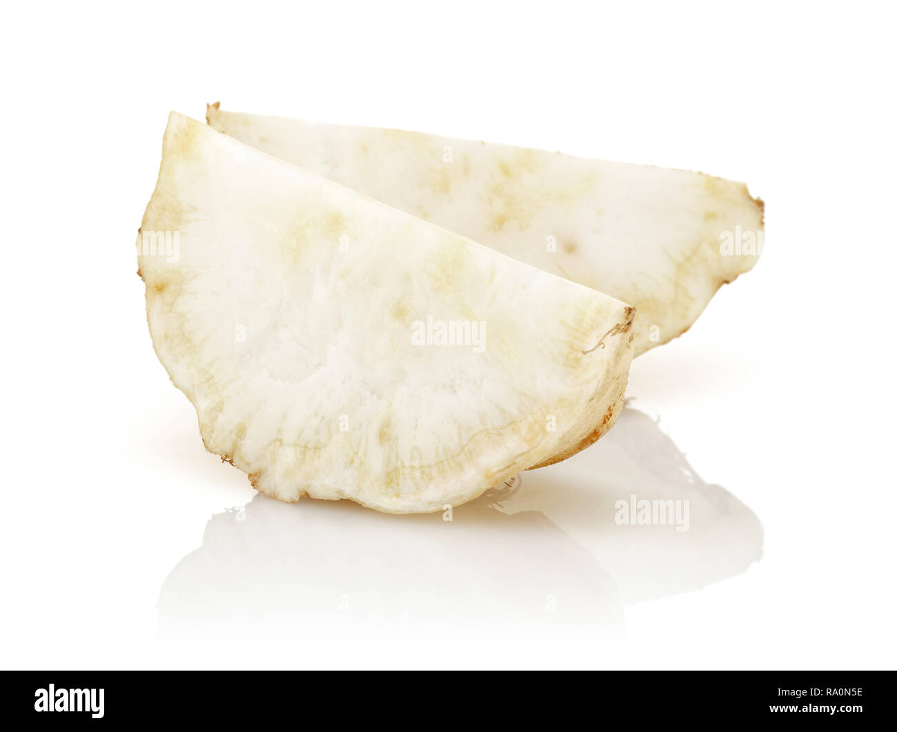 Fresh celery slices isolated on white background. Studio shot. Stock Photo