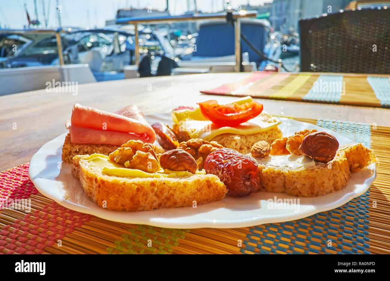 Enjoy the breakfast on yacht with delcious sandwiches and scenic