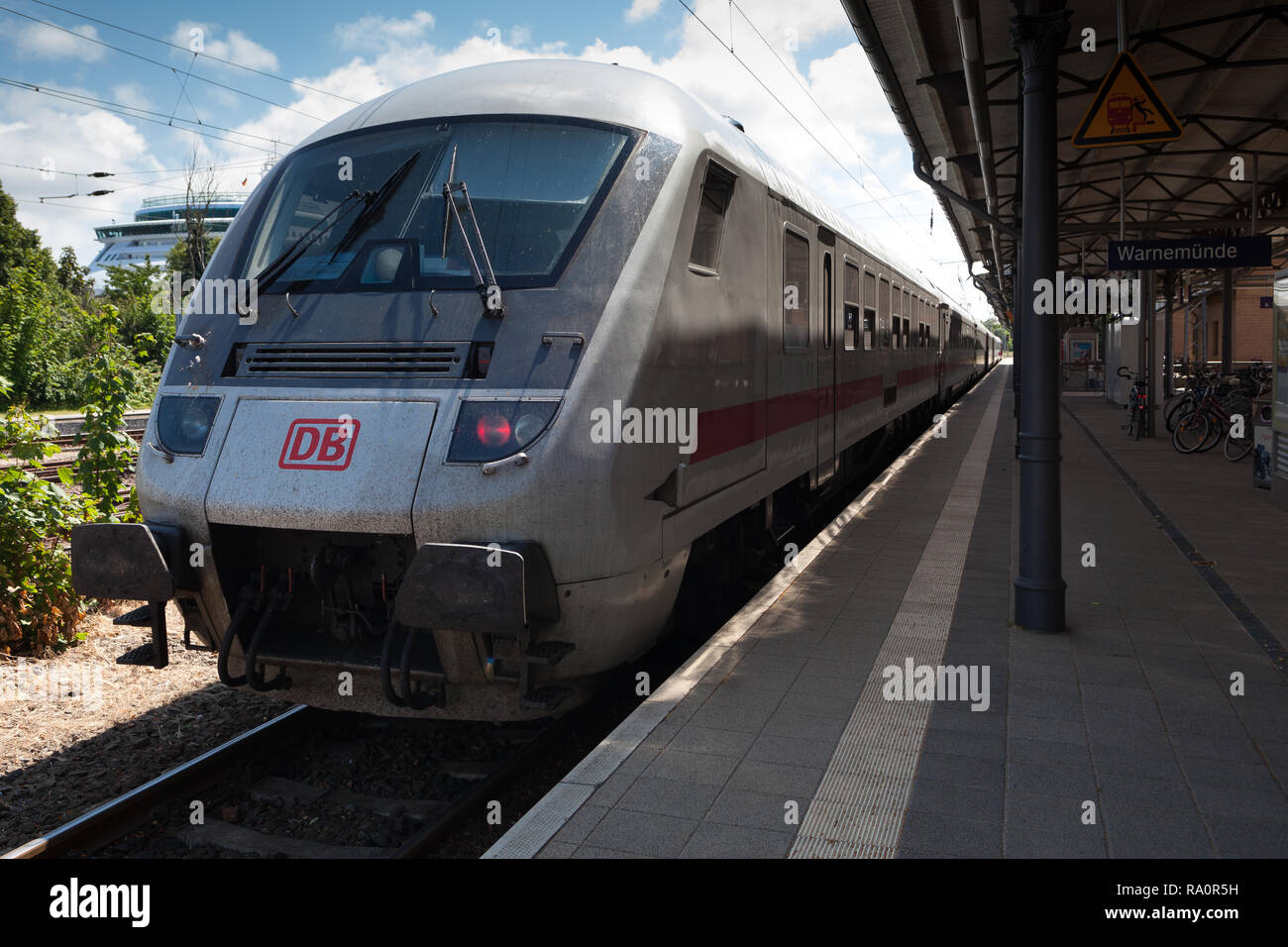 Deutsche Bahn DB high speed German intercity passenger train standing at platform. WARNEMUNDE Germany Stock Photo