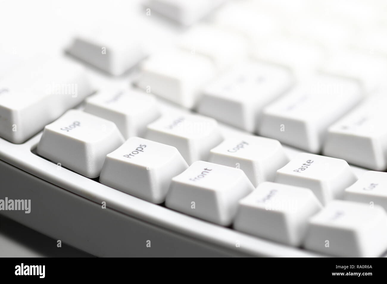 Modern computer keyboard. some part of white computer keyboard, Focus on special key 'Props'. Stock Photo