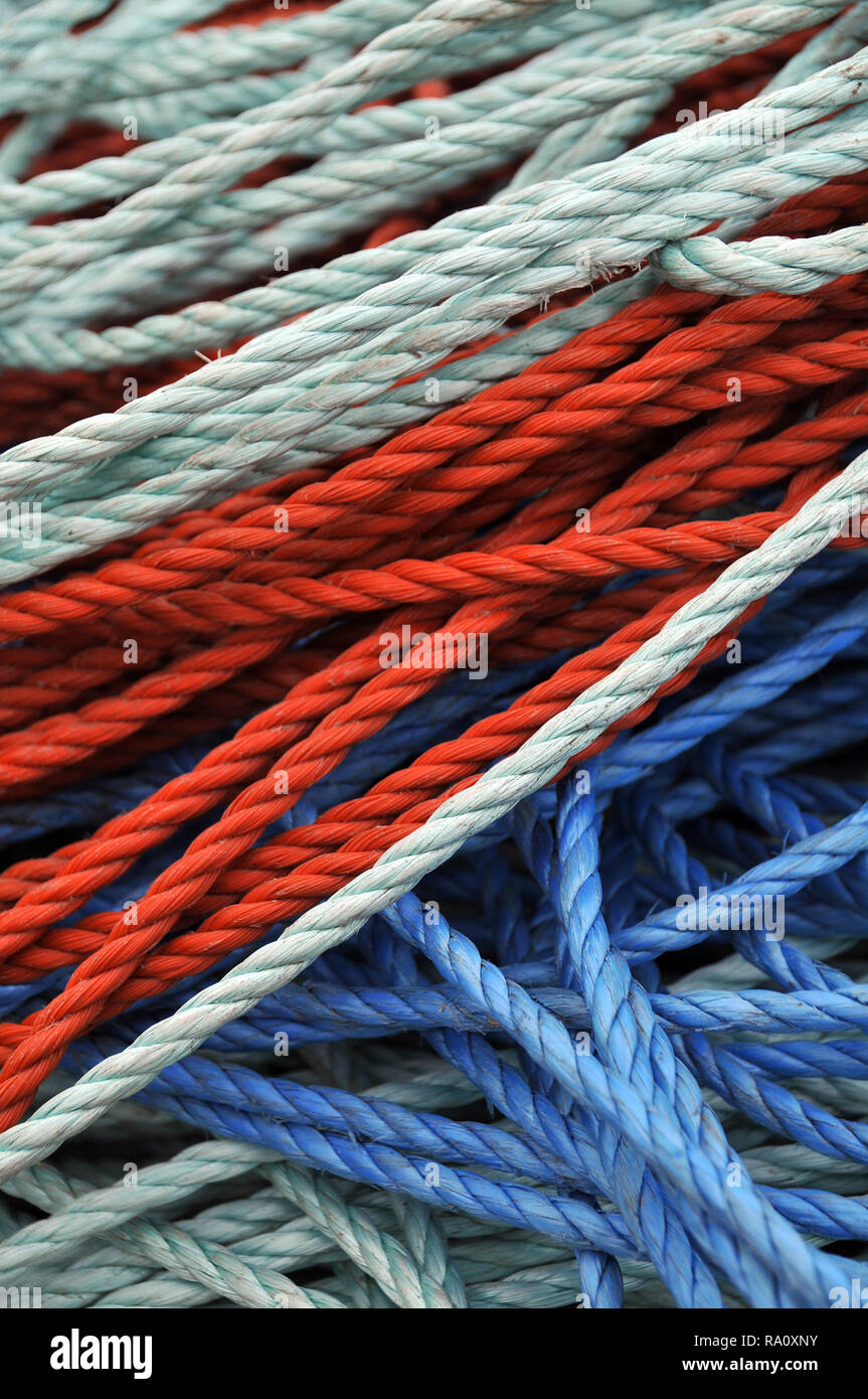 Detail of blue and orange boating mooring rope / ropes Stock Photo