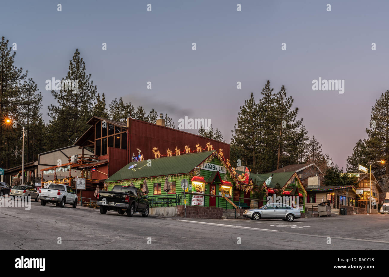 Evergreen Cafe with Santa and Reindeer on roof decorated in Christmas