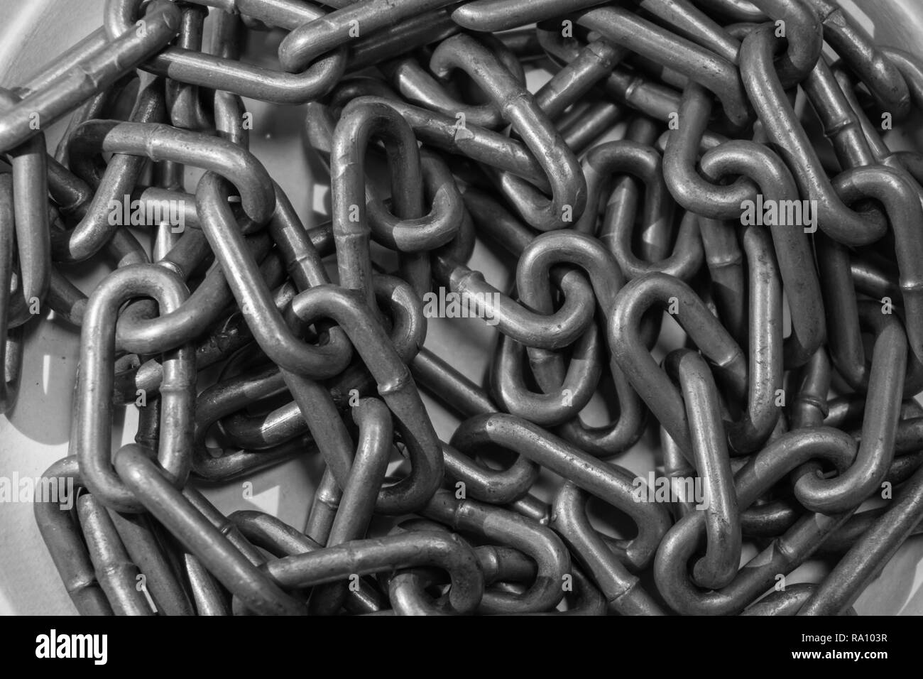 Close-up gray chain background. Photo of metallic chain on background. Stock Photo