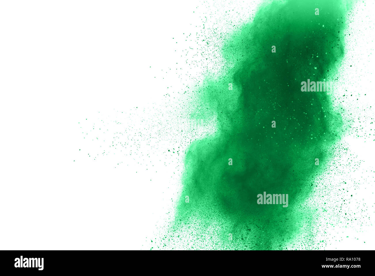 Green powder explosion on white background. Stock Photo