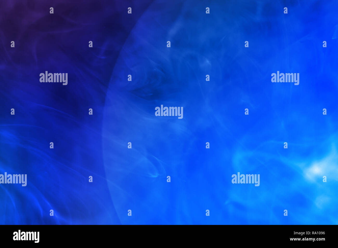 Blue color ink flowed in water. Abstract blue color ink pattern background. Stock Photo