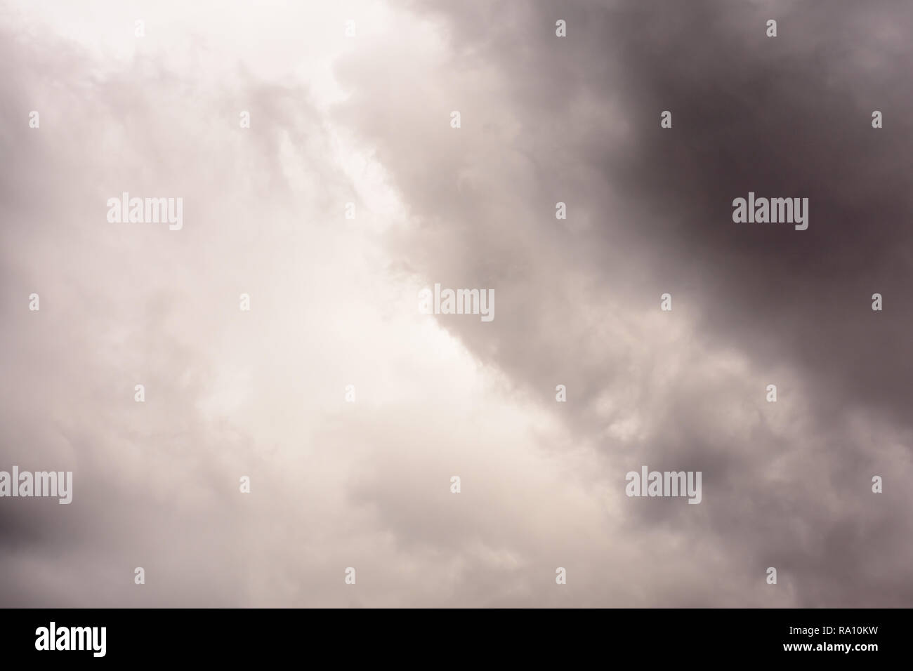 Dark Rain Clouds before thunderstorm. Grey Storm Clouds Before Rain. Stock Photo