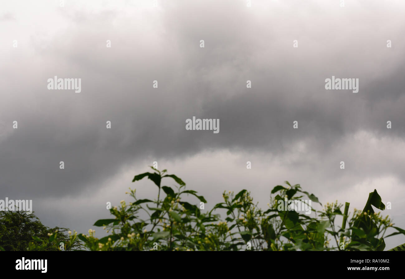 Dark Rain Clouds before thunderstorm. Grey Storm Clouds Before Rain. Stock Photo