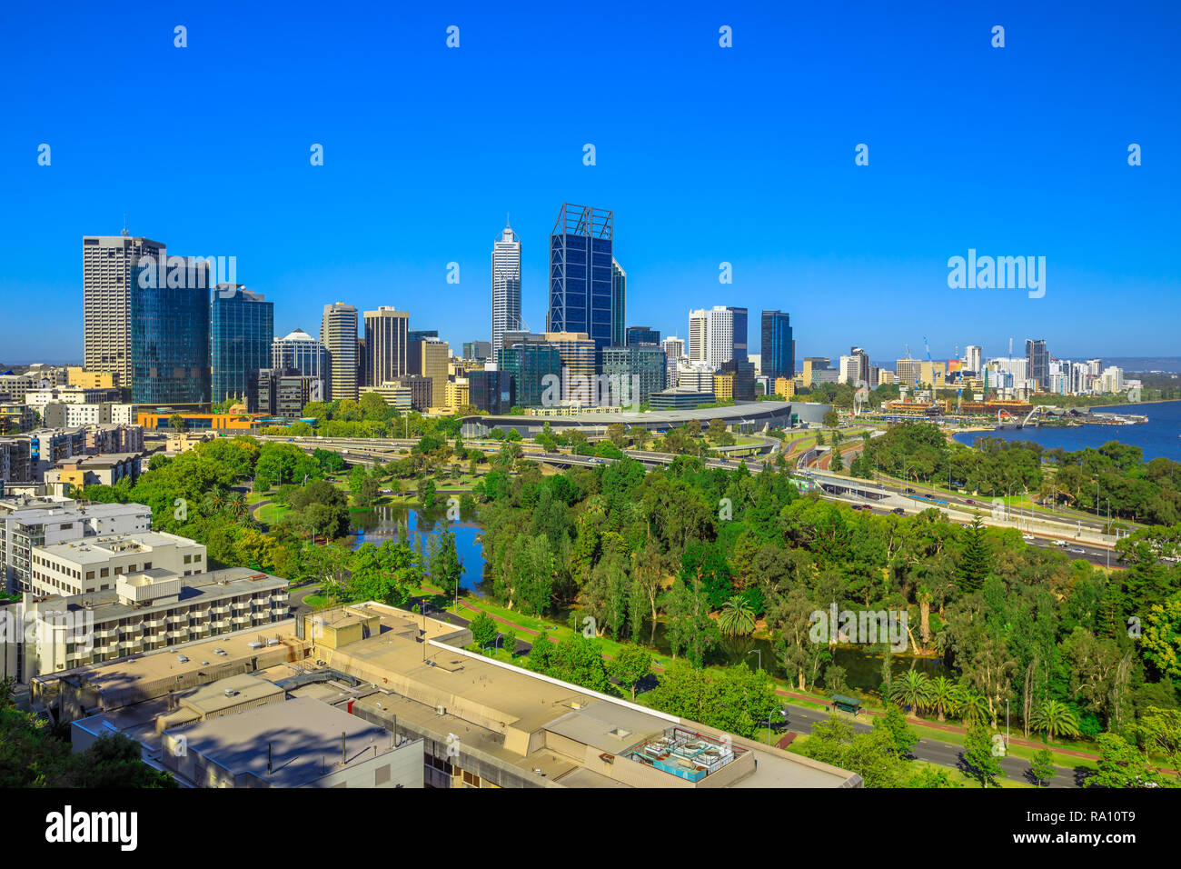 Kings Park overlooking Perth Water, a section of Swan River, and central business district of Perth from the most popular visitor destination in Western Australia. Blue sky. Perth skyline aerial view. Stock Photo