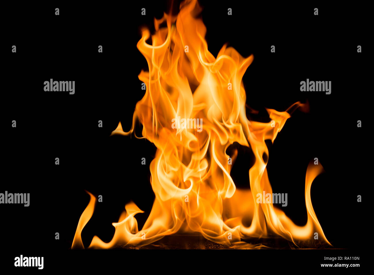 Fire flames on black background. Bright and colorful fire against a ...