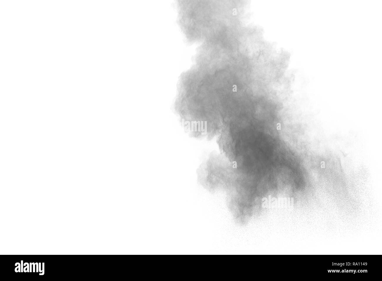 Black powder explosion on white background.Black dust particles splash