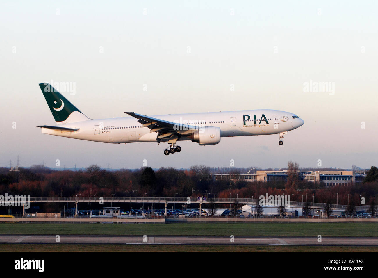 Boeing 777-240, Pakistan International Airlines. PIA. Landing at Heathrow airport terminal 5, London. UK. Stock Photo