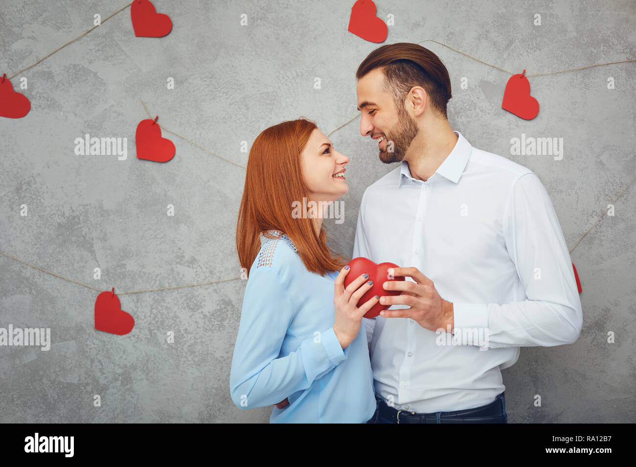 A loving couple with hearts . Valentine's Day.  Stock Photo