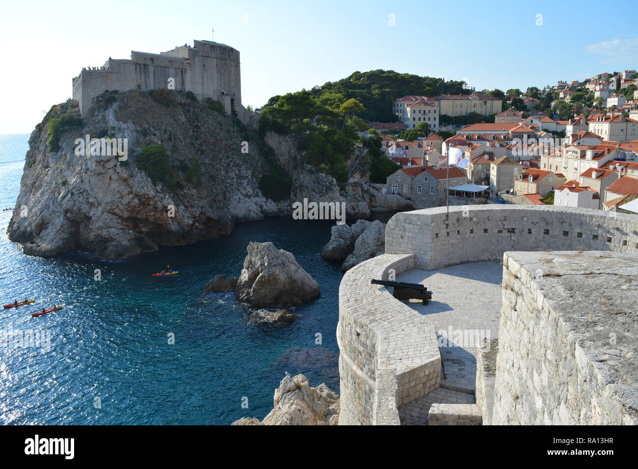 View of cannon and Fort Lawrence, cove and town outside old town dubrovnik city walls Stock Photo