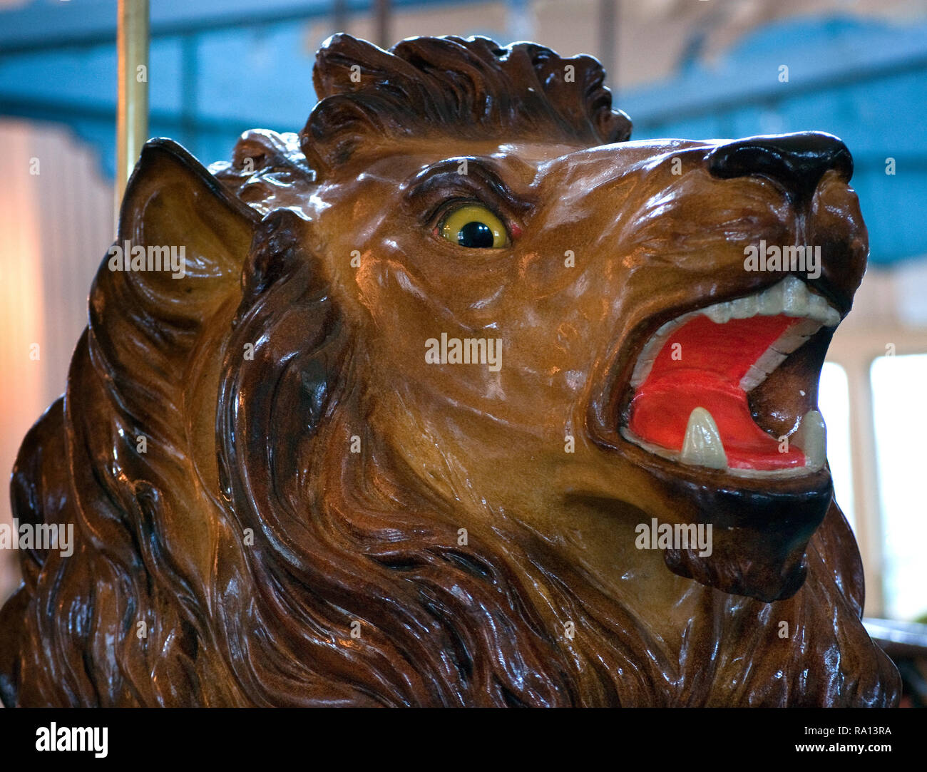 A painted lion is among the fanciful zoo animals at the Dentzel