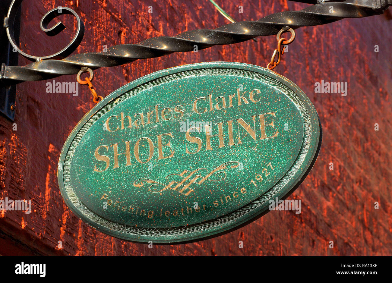 The sign outside The Shine King still bears the name of the former shoe shiner who worked there in Meridian, Mississippi. Stock Photo