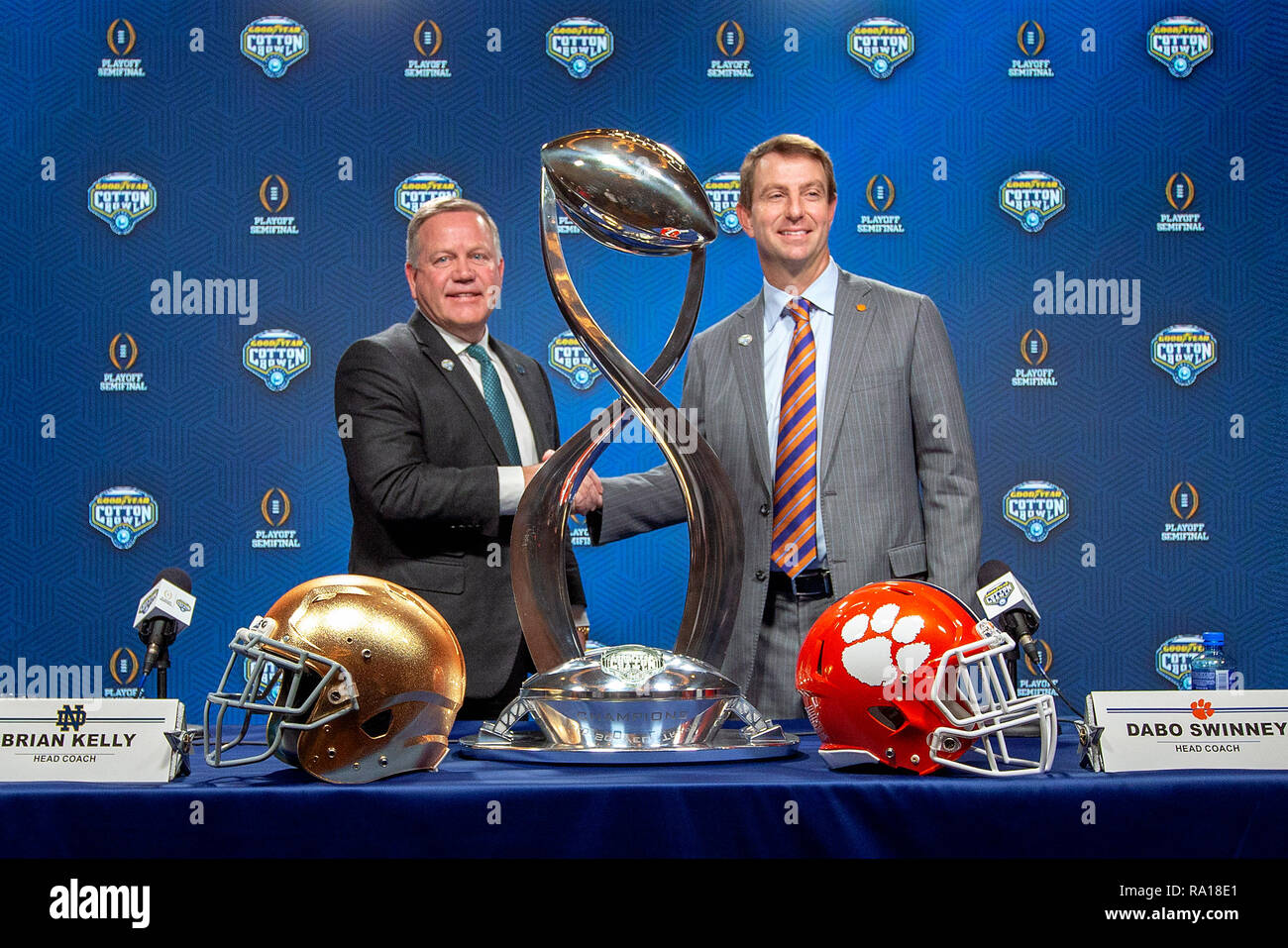 Arlington, Texas, USA. 28th Dec, 2018. Notre Dame head coach Brian Kelly and Clemson head coach Dabo Swinney at the coaches press conference prior to NCAA Football game action between the Notre Dame Fighting Irish and the Clemson Tigers at AT&T Stadium in Arlington, Texas. John Mersits/CSM/Alamy Live News Stock Photo