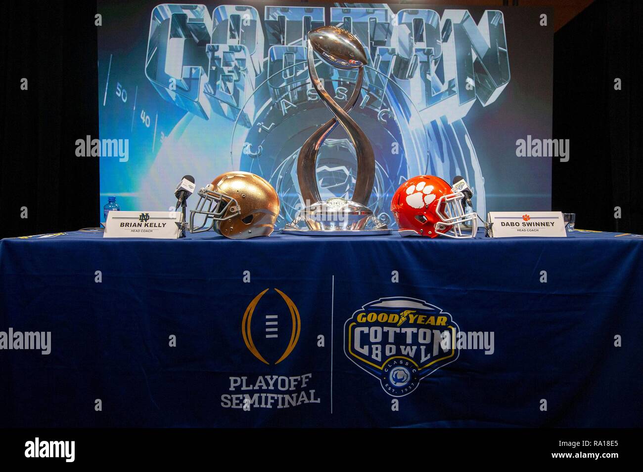 Arlington, Texas, USA. 28th Dec, 2018. A general view of the helmets and trophy at the coaches press conference prior to NCAA Football game action between the Notre Dame Fighting Irish and the Clemson Tigers at AT&T Stadium in Arlington, Texas. John Mersits/CSM/Alamy Live News Stock Photo
