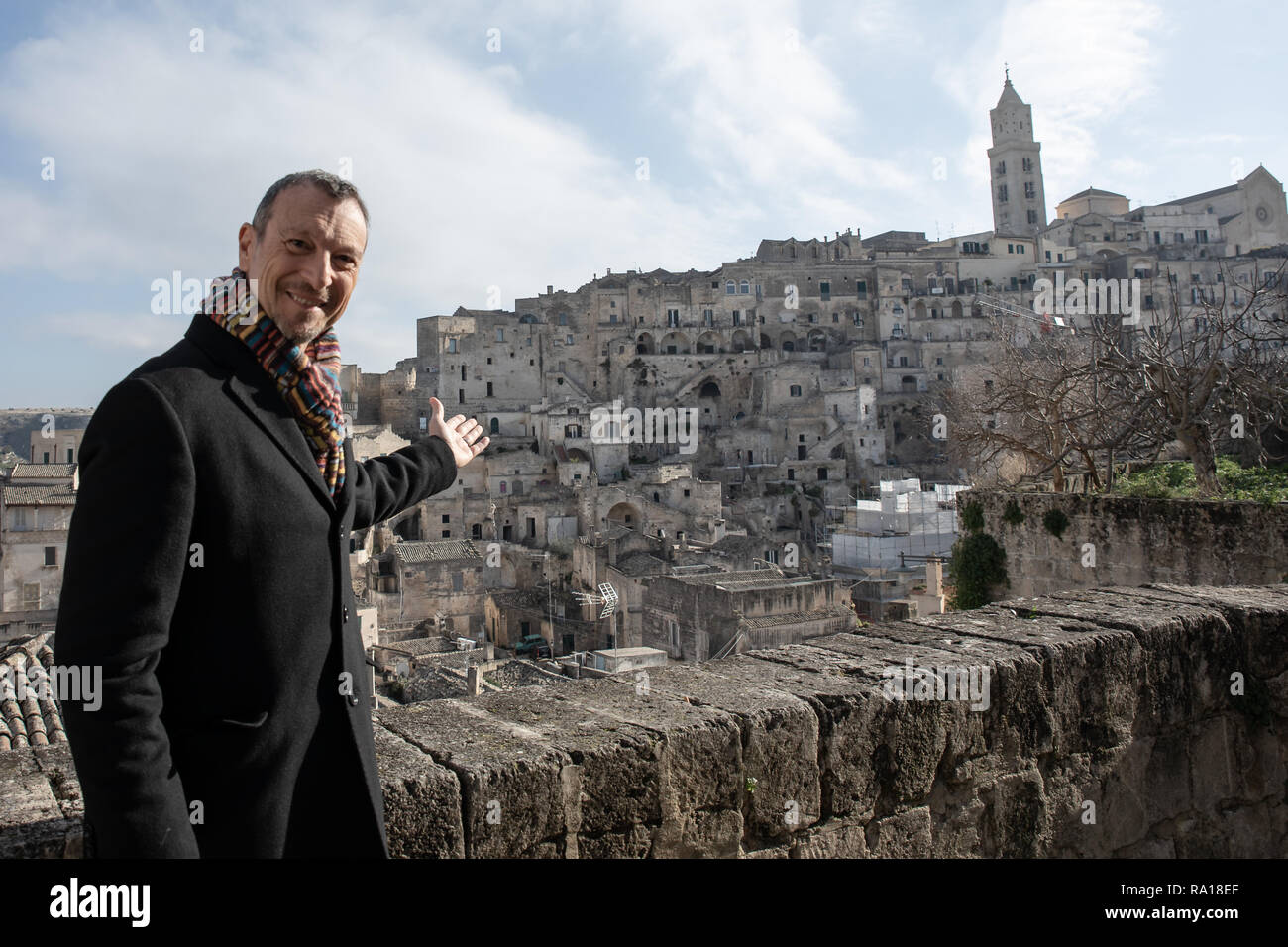 Amadeus presenter of the rai 1 television program of the new year "l'anno  che verrà" seen indicating and looking at the matera stones before the  press conference Stock Photo - Alamy