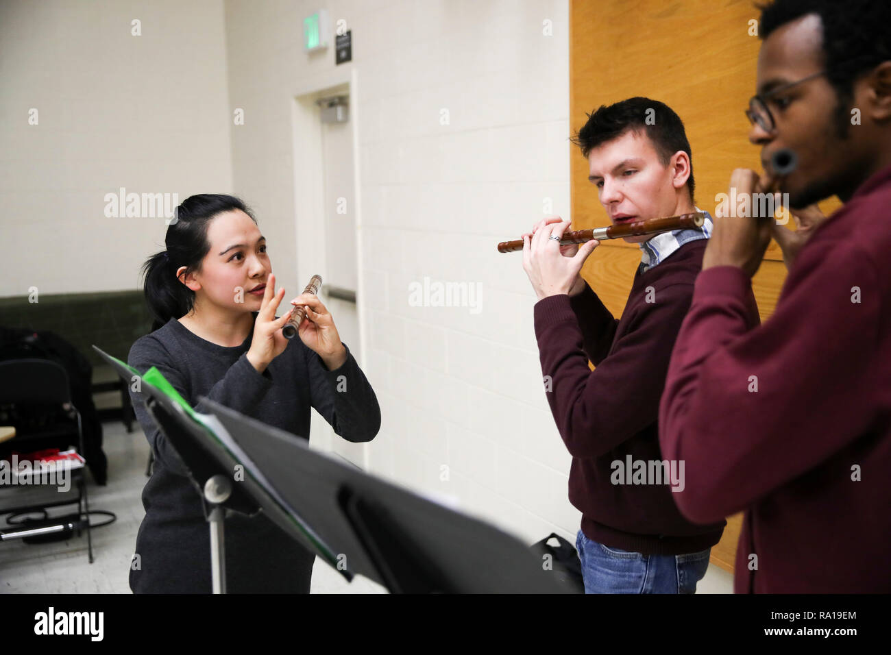New York, USA. 29th December 2018. Chen Yuxiao (L), an artist and teacher  from the Confucius Institute of Chinese Opera (CICO), gives a flute class  to students at Binghamton University (BU) in