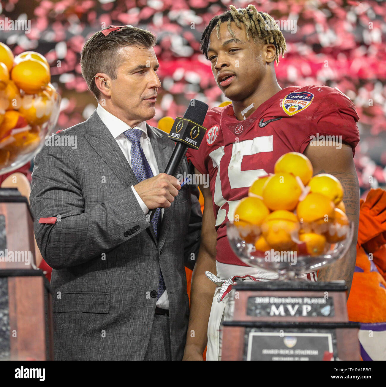 Miami Gardens, Florida, USA. 29th Dec, 2018. Defensive MVP Xavier McKinney #15 is interviewed by Rece Davis during the awards ceremony of the Capital One Orange Bowl game between the Alabama Crimson Tide and the Oklahoma Sooners at Hard Rock Stadium in Miami Gardens, Florida. Kyle Okita/CSM/Alamy Live News Stock Photo