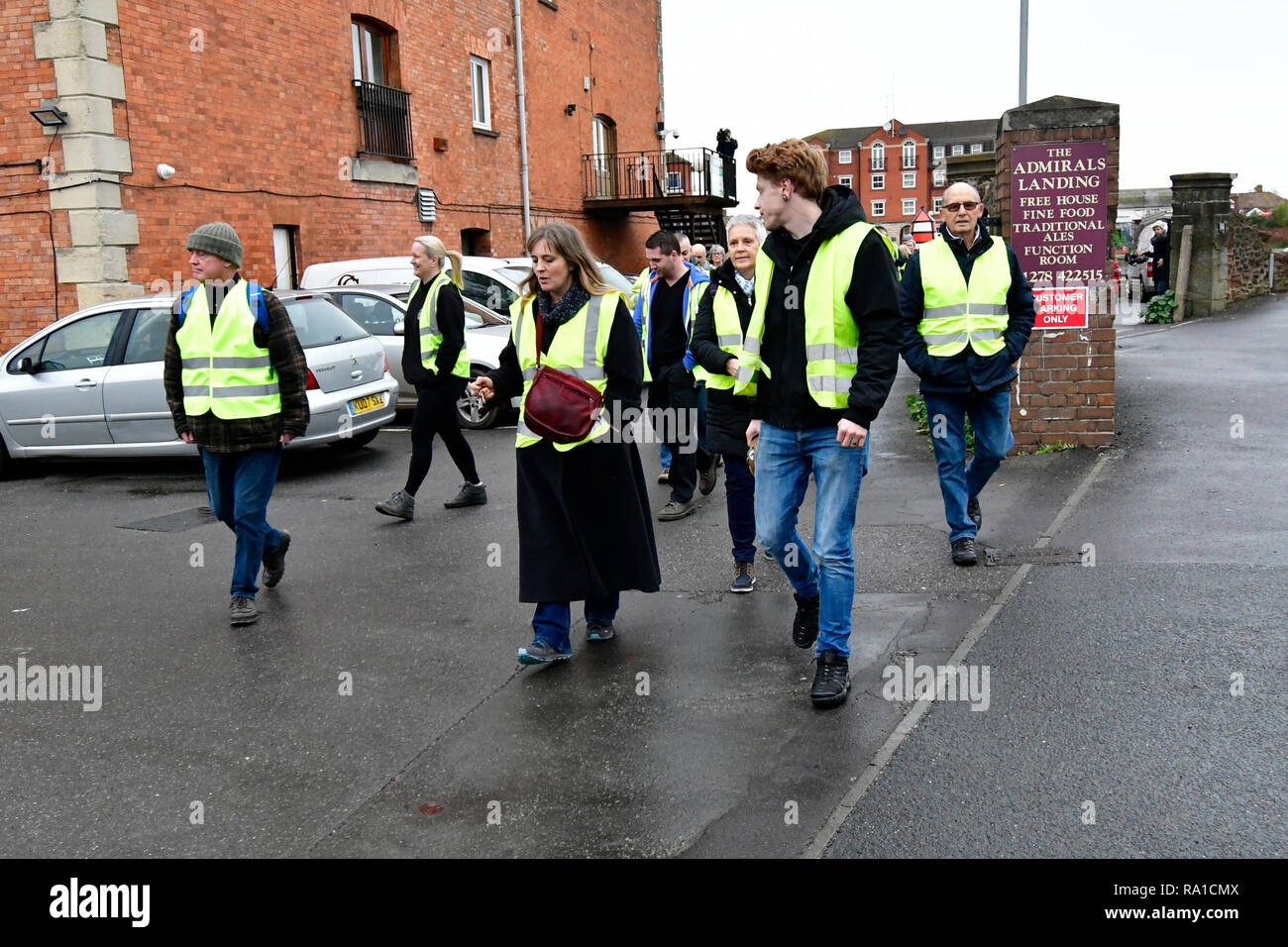Bridgewater, Somerset, UK. 30th December 2018. UK in Bridgewater Yellow Vest protesters take to the streets and march from Bridgewater Docks to Sedgemoor District Councl office Bridgewater House in King's Square,in protests over local Councillors High Expenses and how things are run. Credit: Robert Timoney/Alamy Live News Stock Photo
